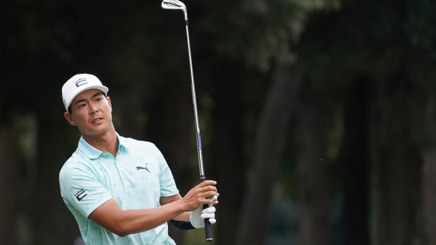 Justin Suh hits a shot on the 17th hole in the third round of the PGA Tour Zozo Championship in suburban Tokyo on Oct. 21, 2023.